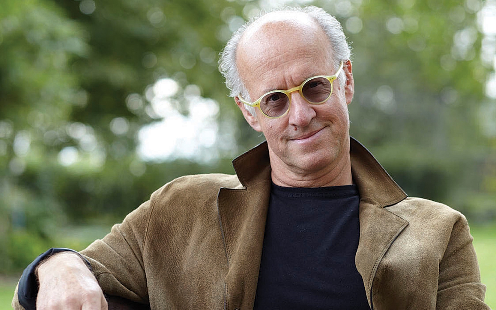Roger Saul (holding His First Mulberry Creation, A Briefcase), Founder