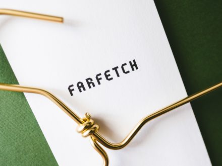 Farfetch logo and coat hanger