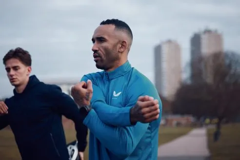 Man running in Castore jumpers