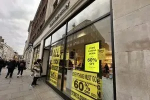 Russell & Bromley Covent Garden store with signs advertising clearance Sale