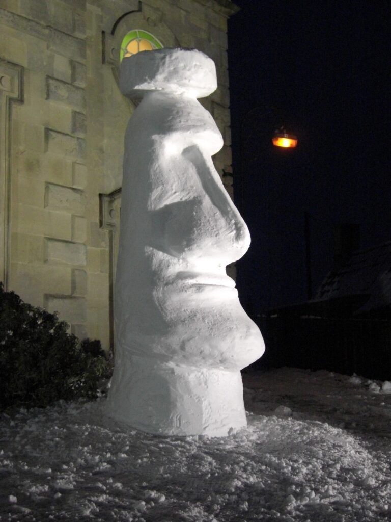 Architectural Snowman Enjoys adverse Weather Conditions 
