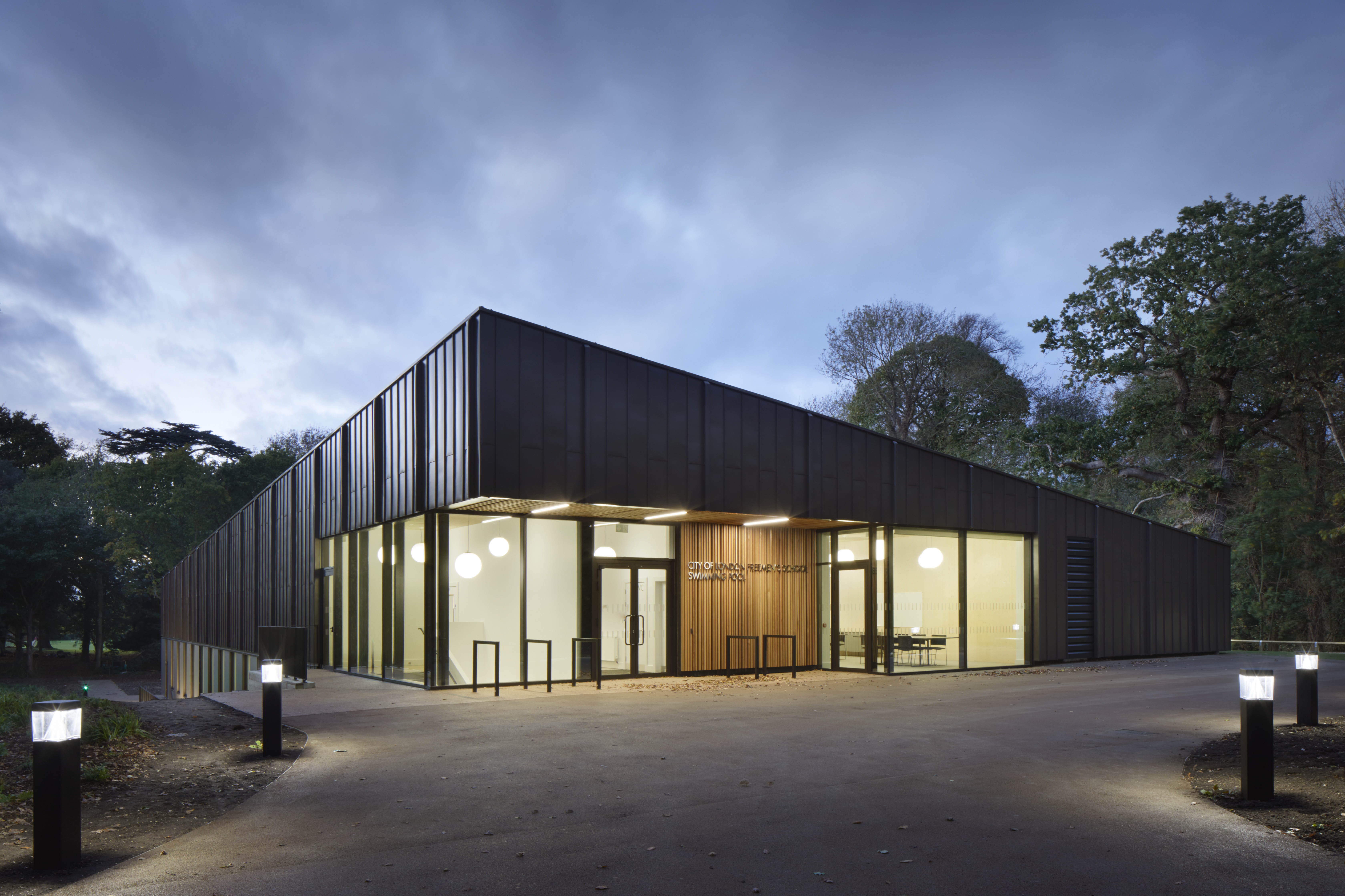 Hawkins\Brown completes engineered timber school swimming pool