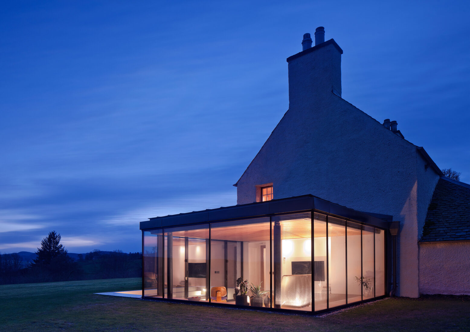 TAP Architects completes ‘glass-room’ extension to historic house