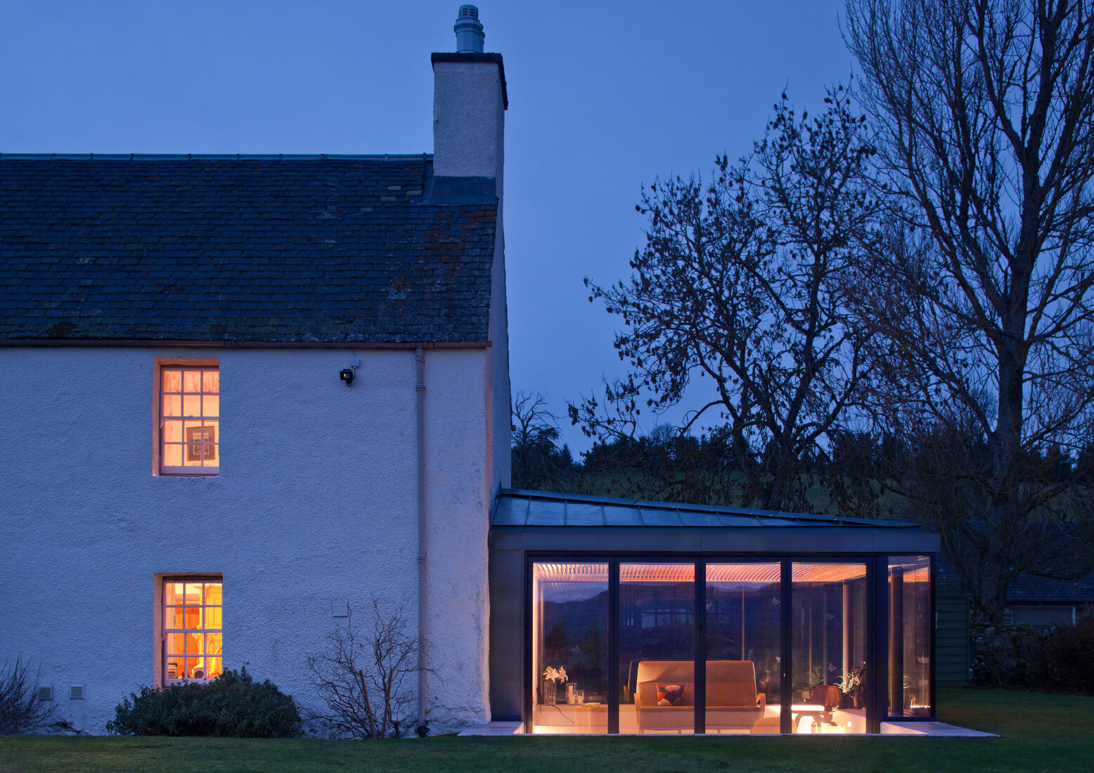 TAP Architects completes ‘glass-room’ extension to historic house