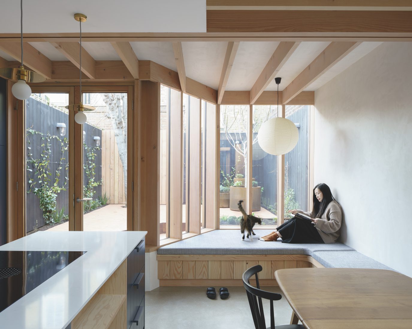 Emil Eve refurbishes house with Douglas fir-lined extension