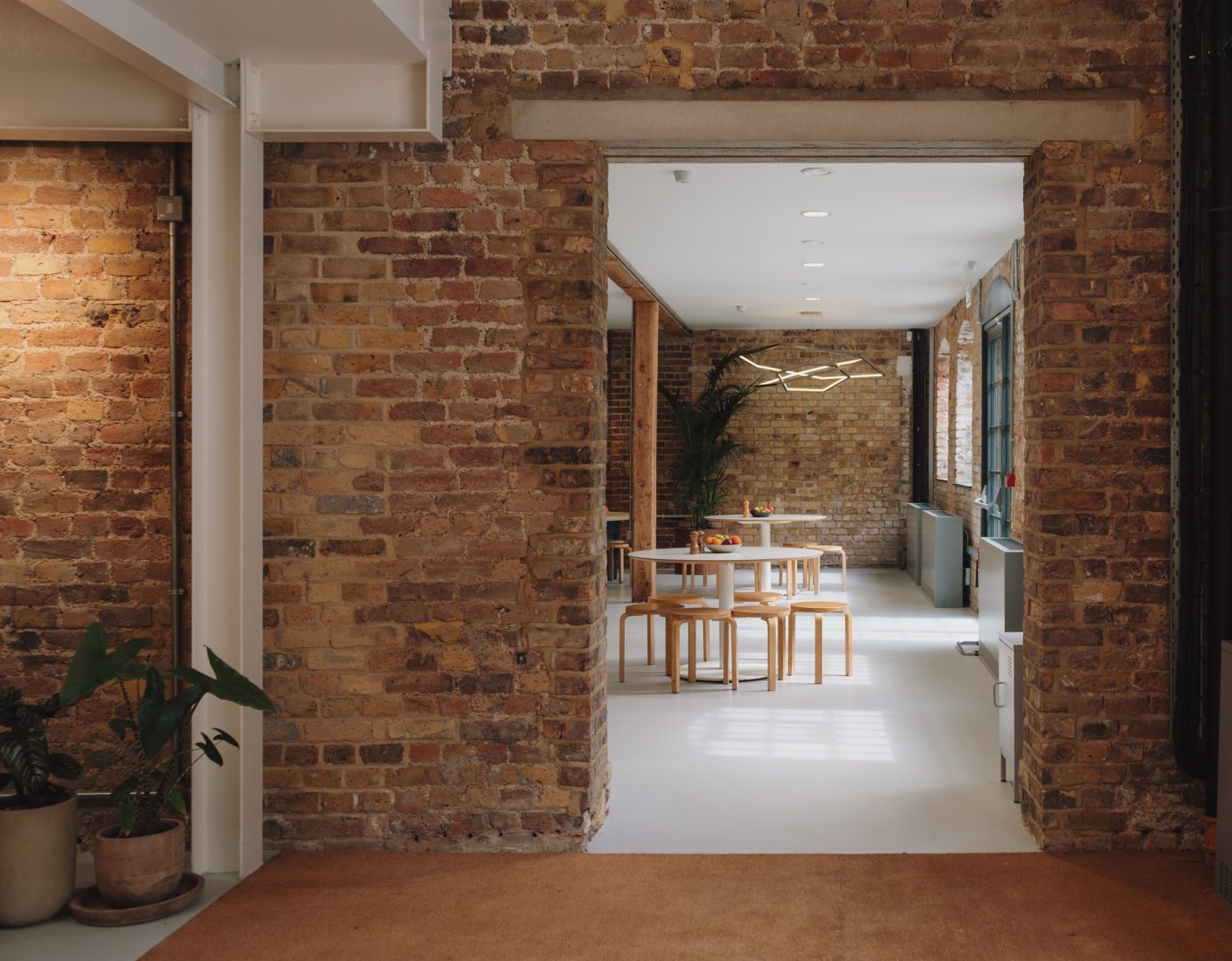 HTA retrofits Hackney Wick warehouse as its own studio