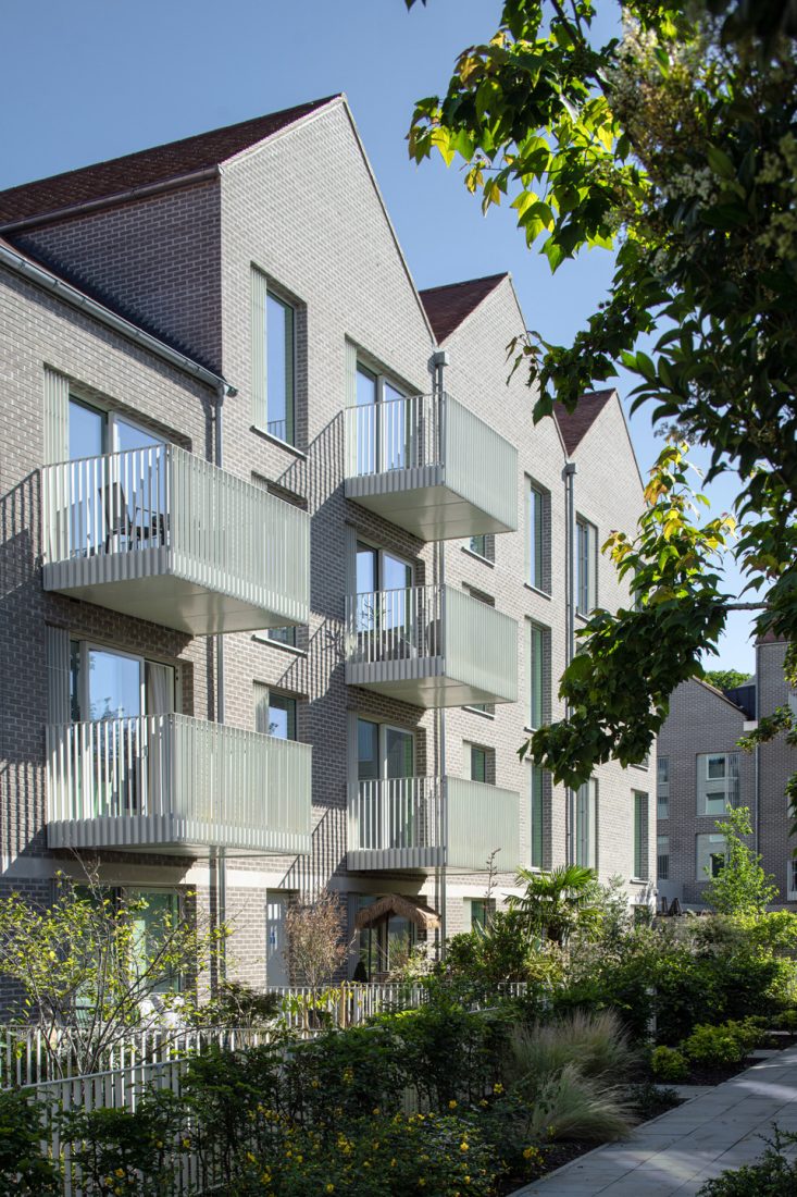 Coffey Architects completes ‘village life’-inspired later living housing