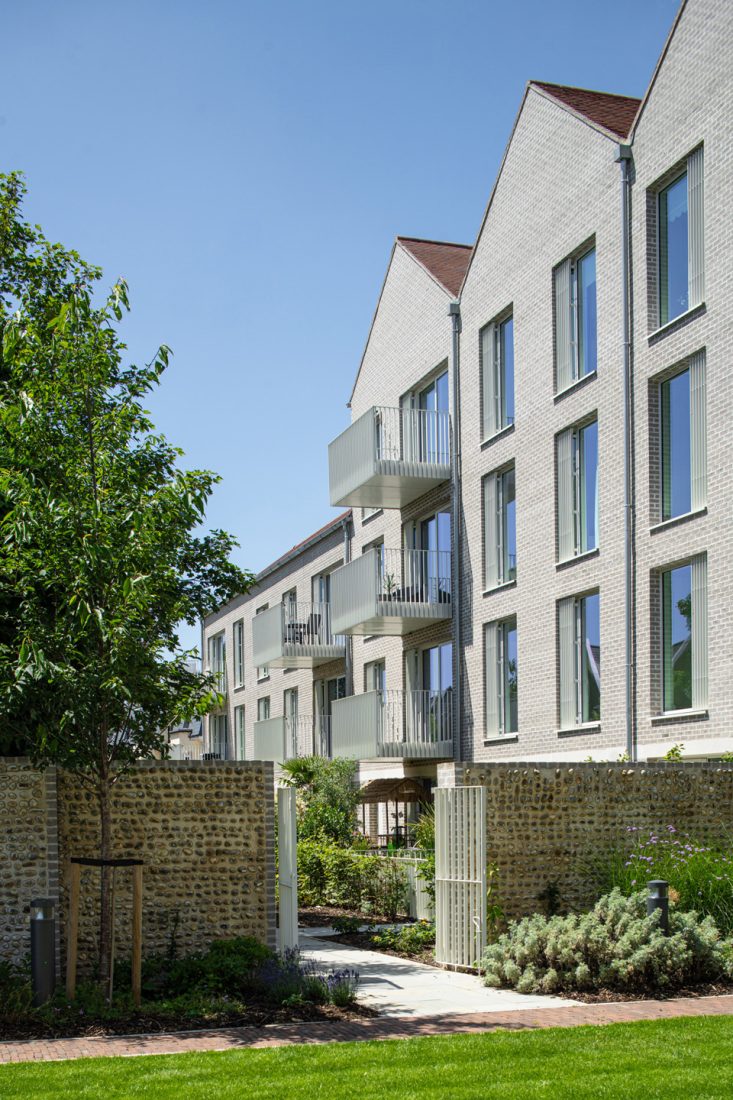 Coffey Architects completes ‘village life’-inspired later living housing