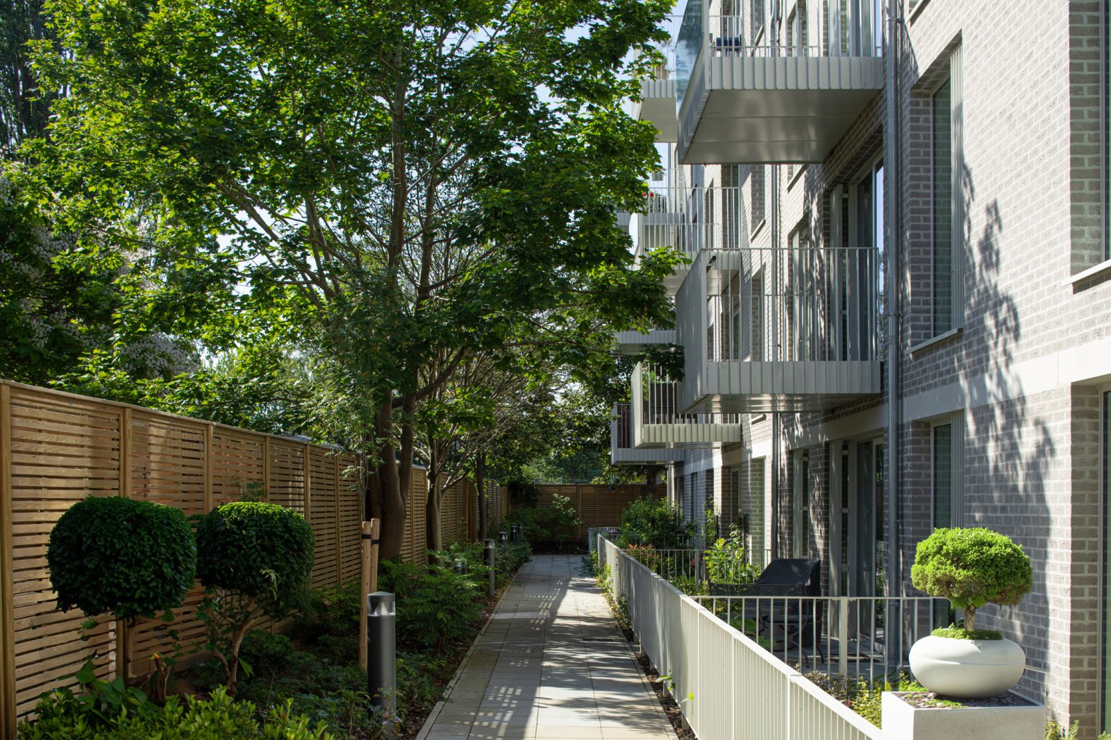 Coffey Architects completes ‘village life’-inspired later living housing