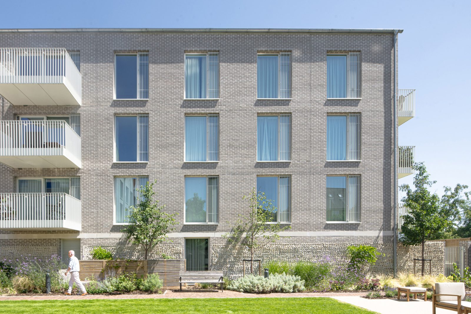 Coffey Architects completes ‘village life’-inspired later living housing