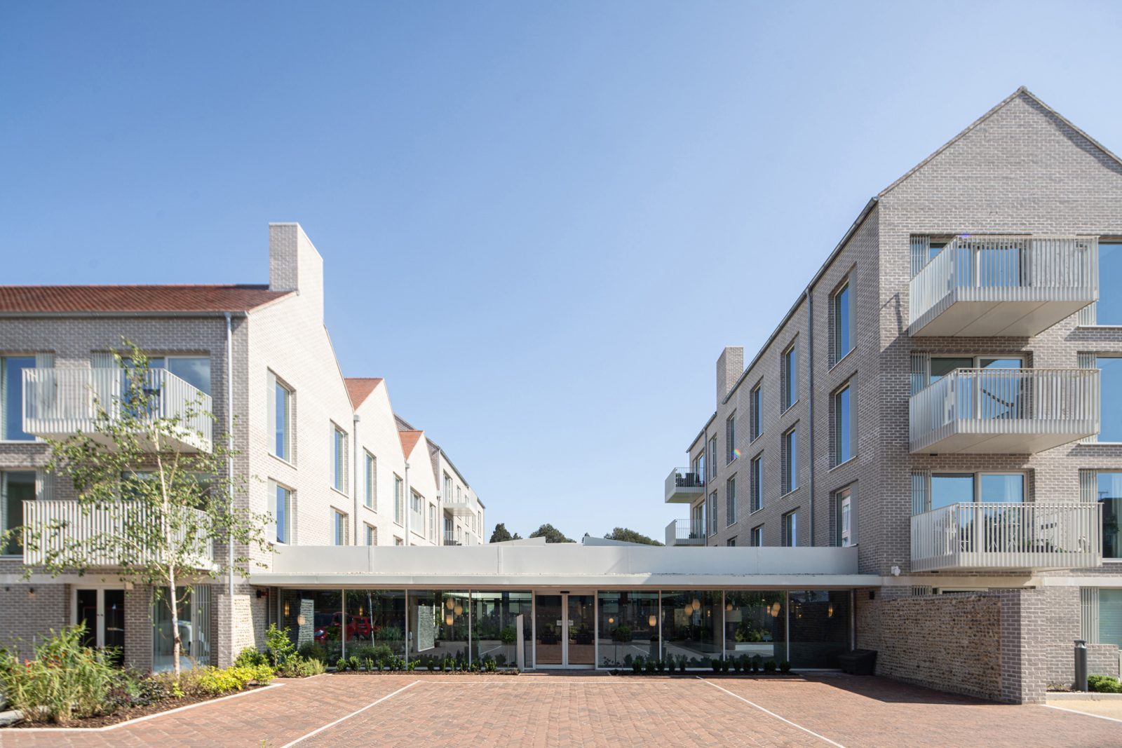 Coffey Architects completes ‘village life’-inspired later living housing