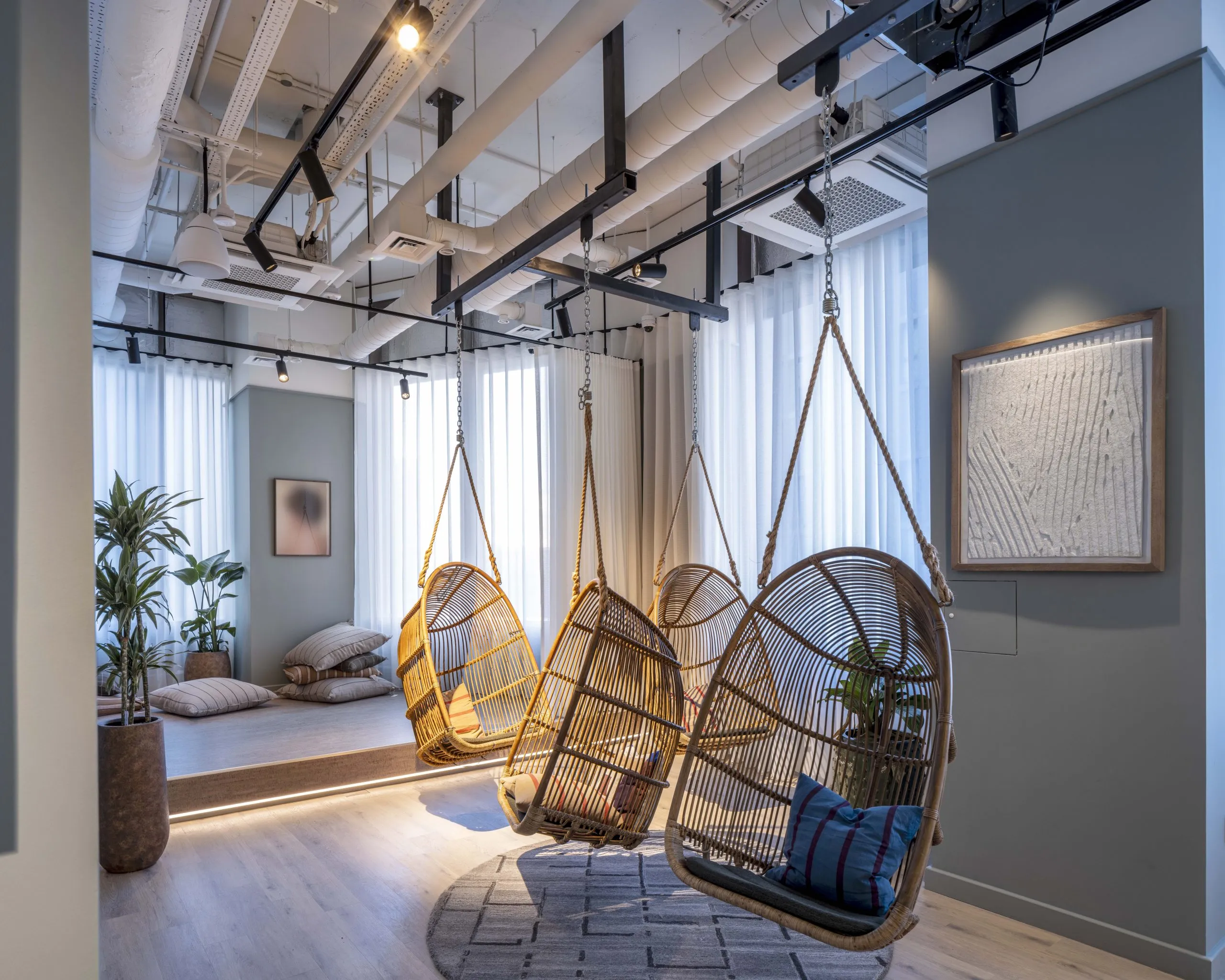 HTA Design completes modular co-living tower with pub at base