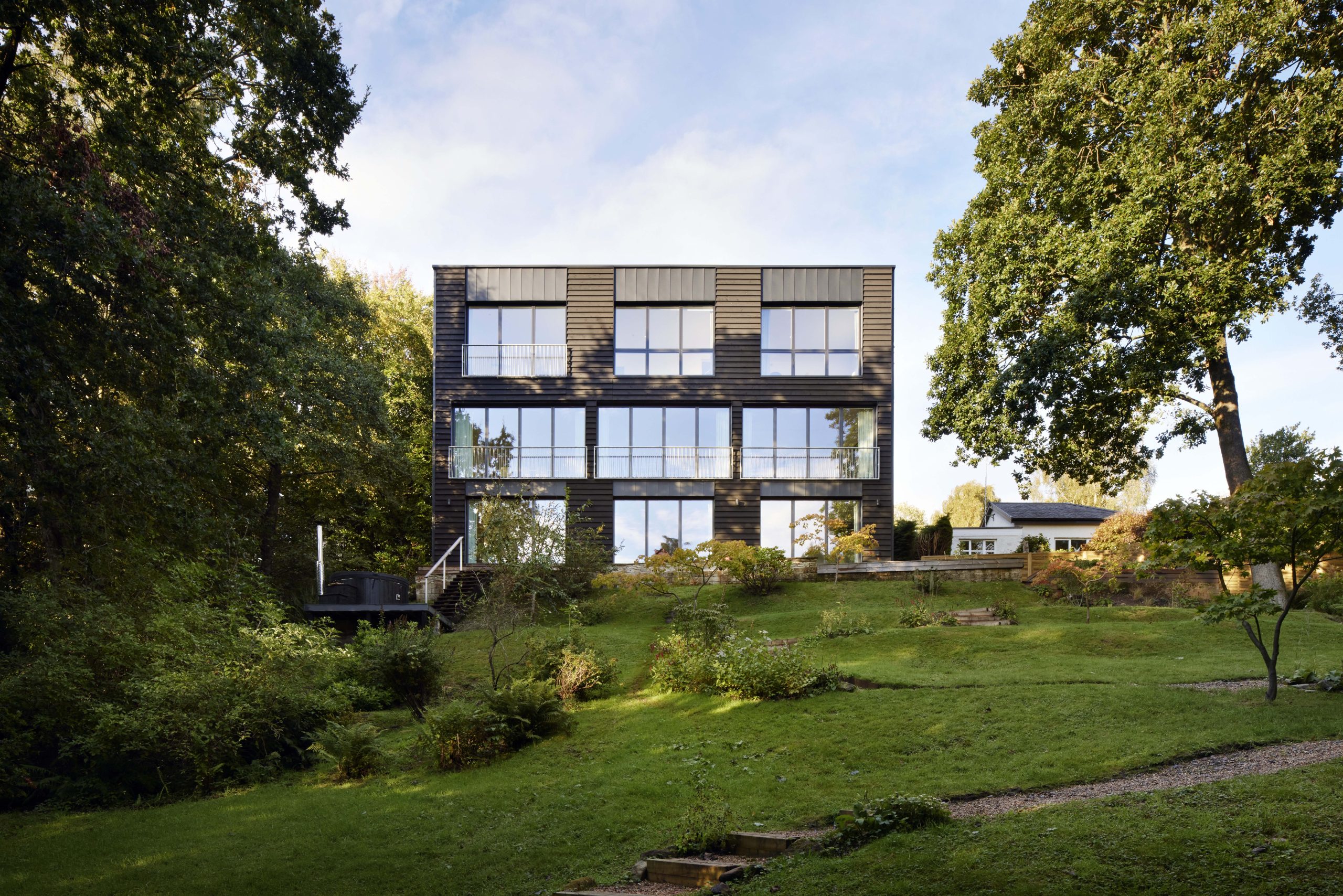 McGinlay Bell extends and upgrades 1980s suburban house in Dunbartonshire